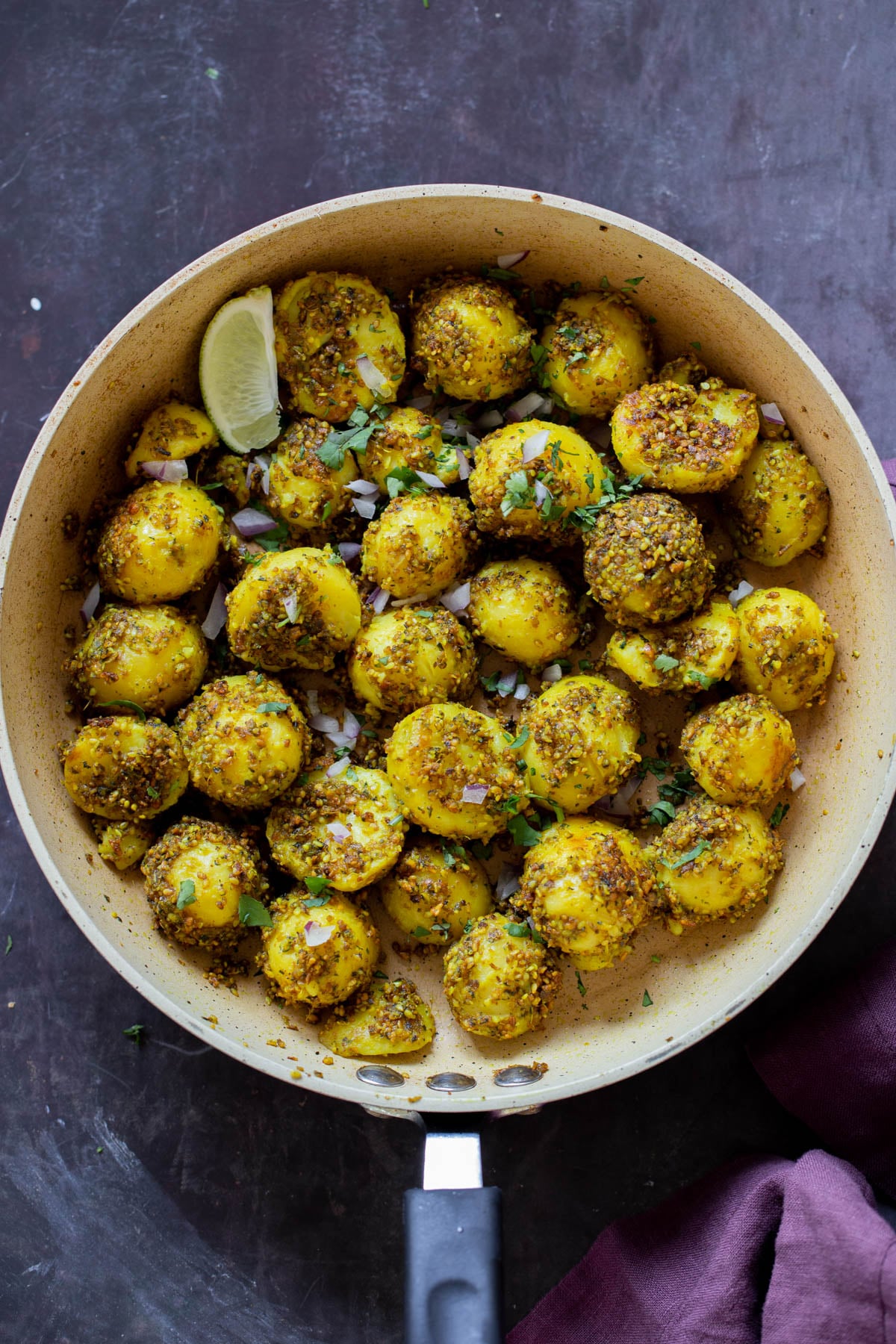peanut sesame potatoes in the frying pan, after cooking