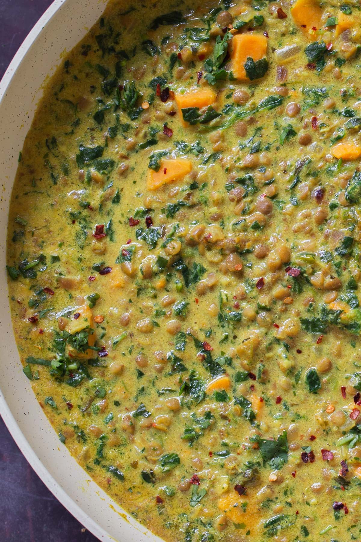 close-up of lentil coconut curry in the pan