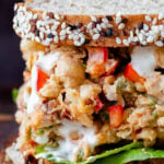 close-up of the cajun chickpea salad sandwich, so you can really see the creamy texture