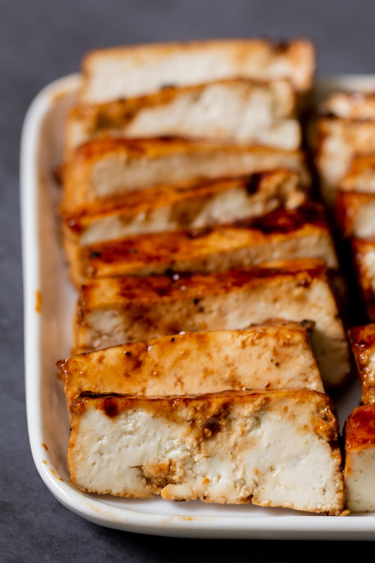 close-up of seared tofu slices on a plate