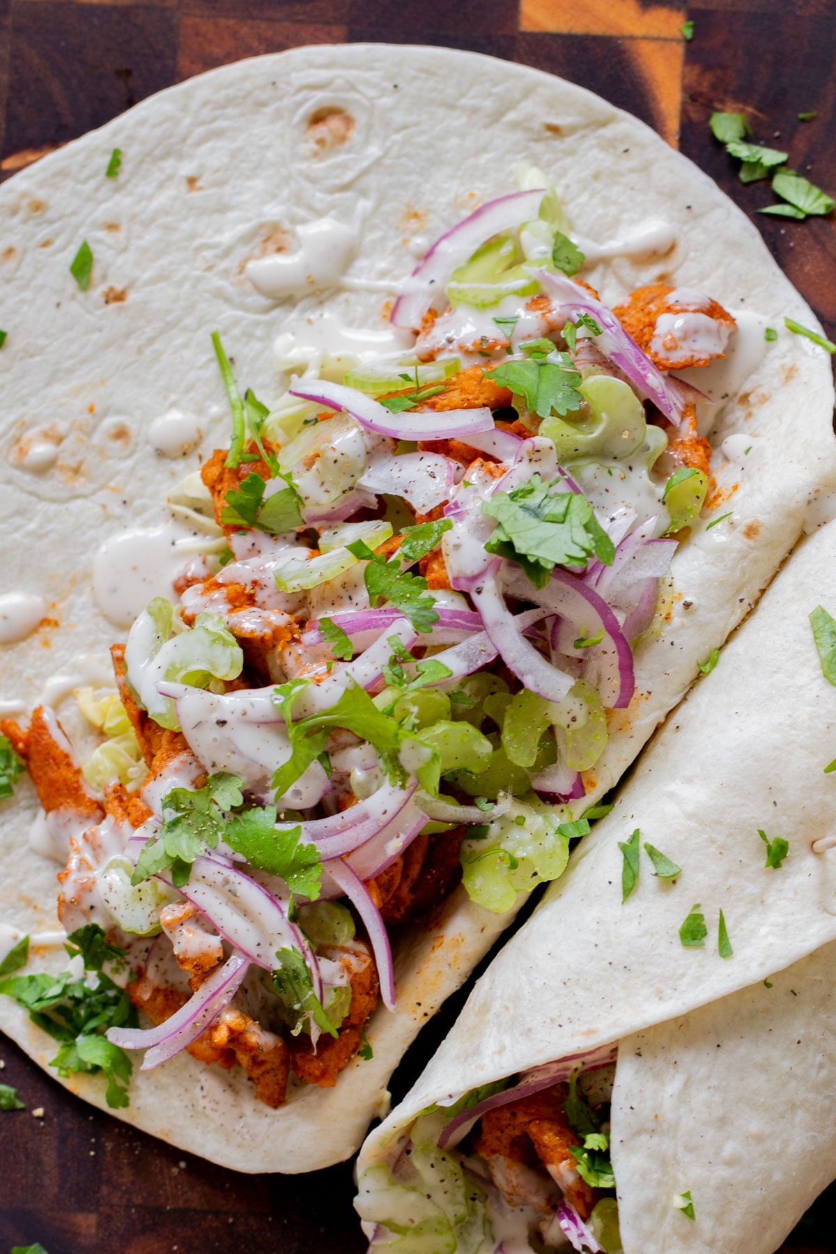 close-up of an open buffalo cajun wrap, so you can see the filling