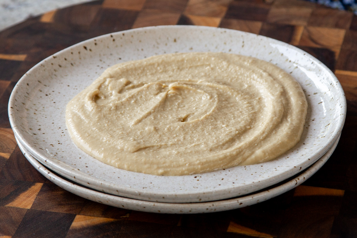 hummus spread onto a plate