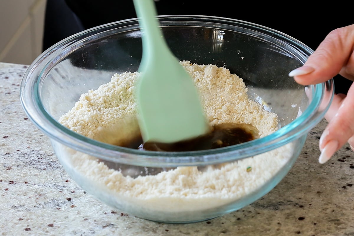 adding wet ingredients to the mixed up dry ingredients