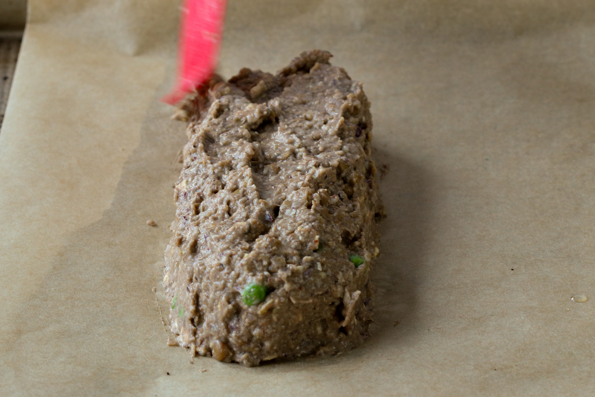 shaping the lentil loaf on the baking sheet