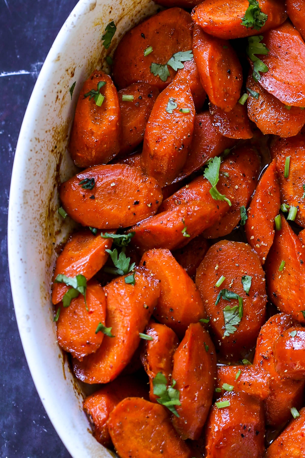 close-up of spiced glazed carrots in the baking dish