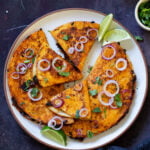mushroom quesatacos cut up on a plate, so you can see the filling better