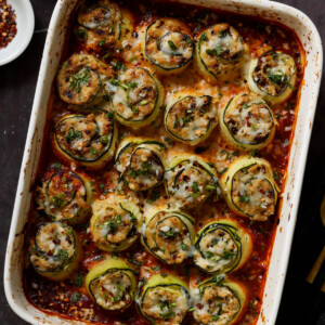zucchini rolls in the baking dish after baking