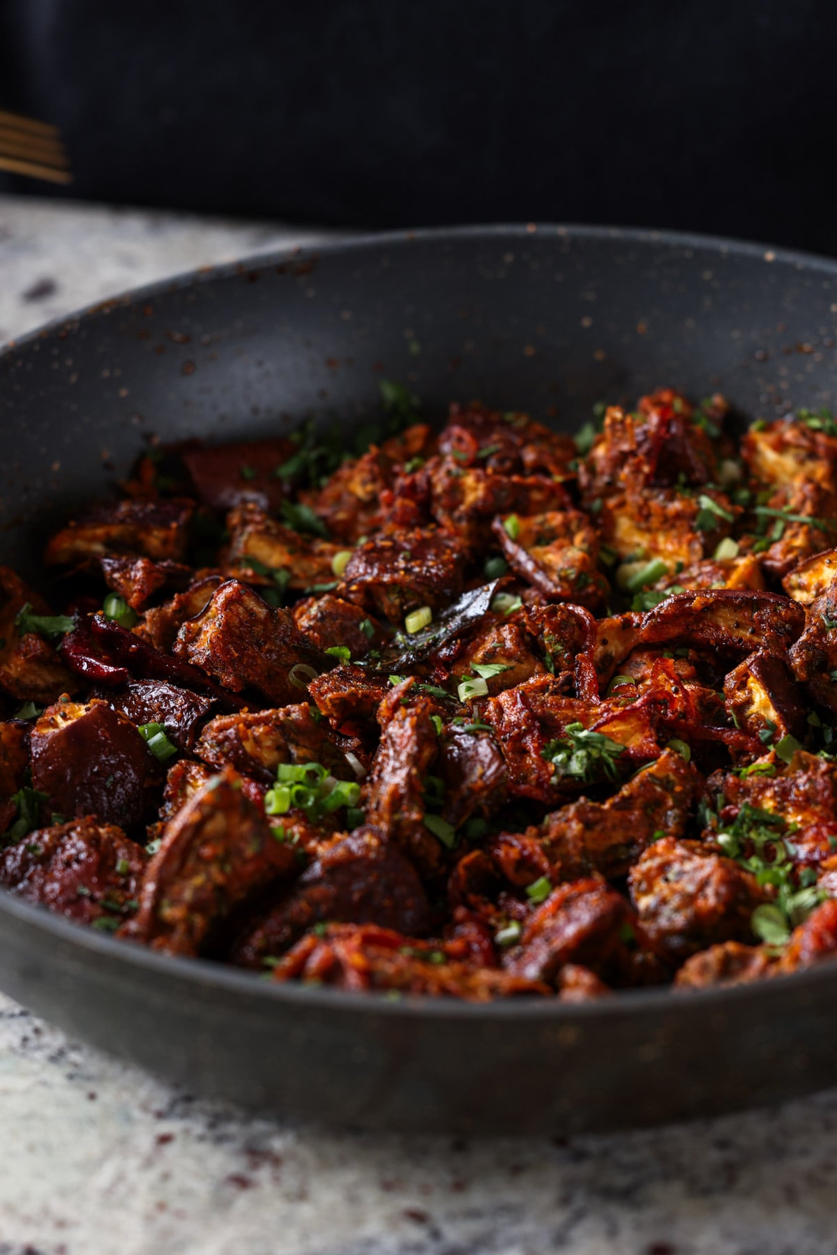 close-up of malabar eggplant in the pan
