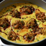 close-up of a pan of pan of kadhi pakora