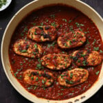 pan of peri peri chicken with garnish
