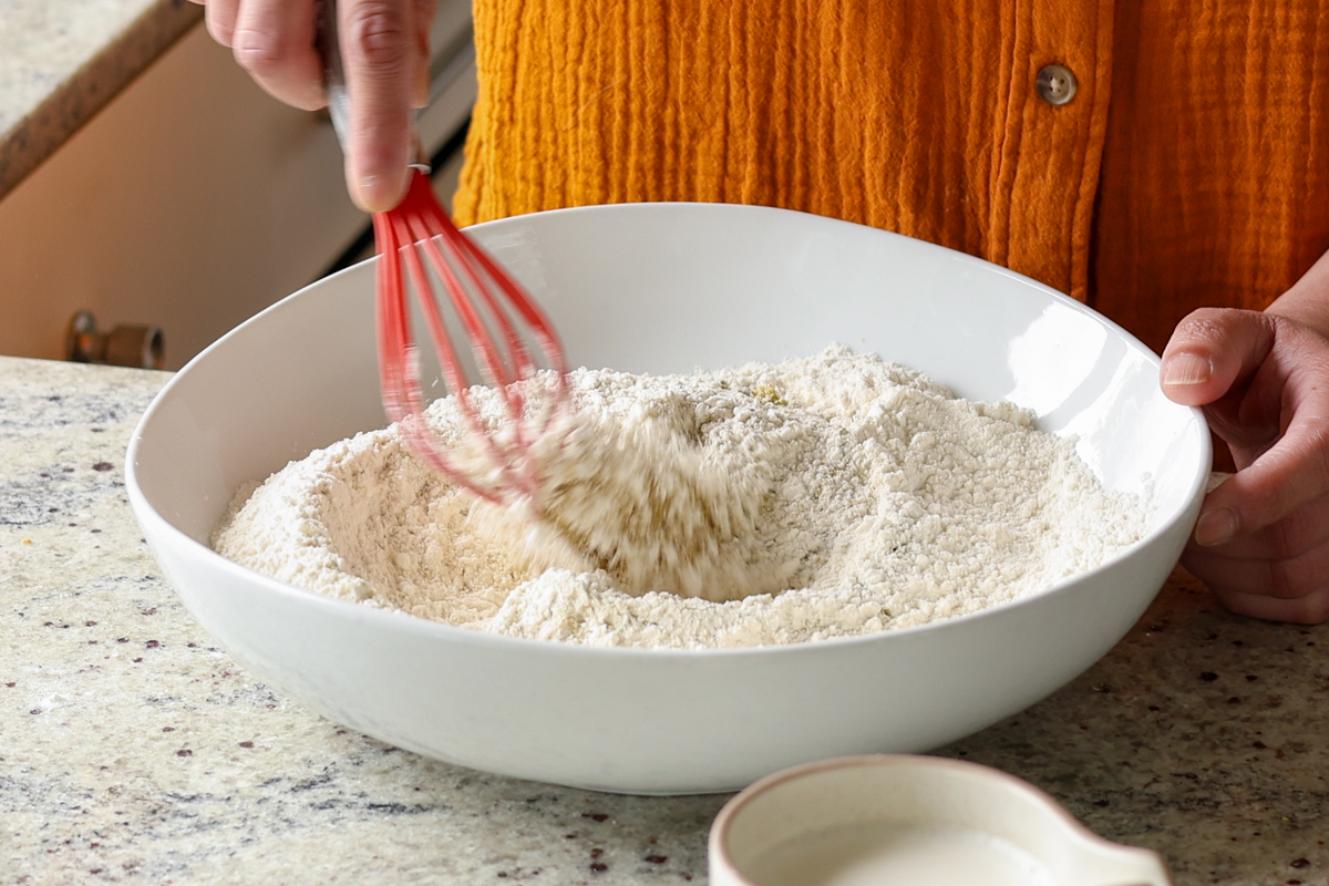 mixing the dry ingredients for the pistachio cake
