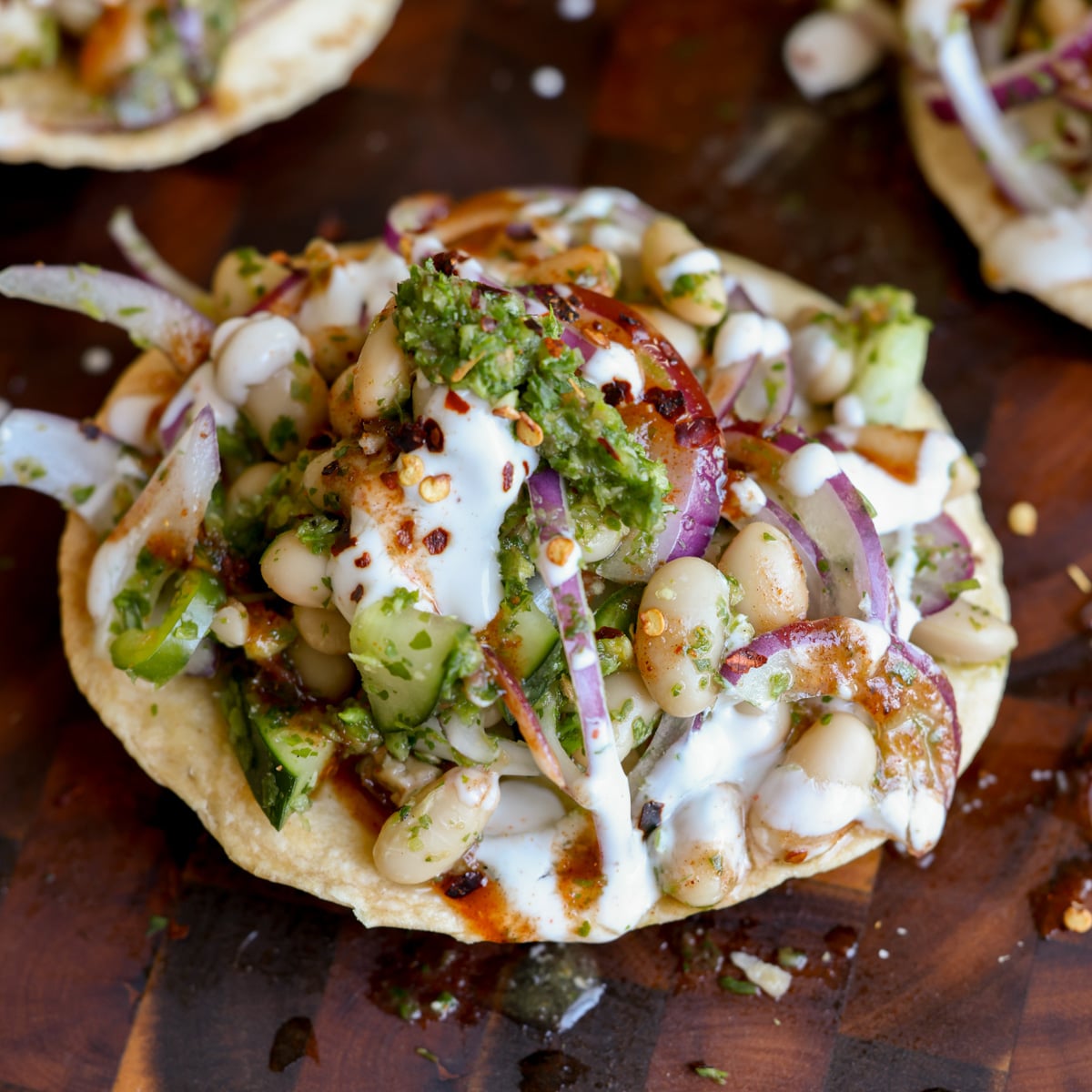 close-up of chutney bean tostadas on the cutting board