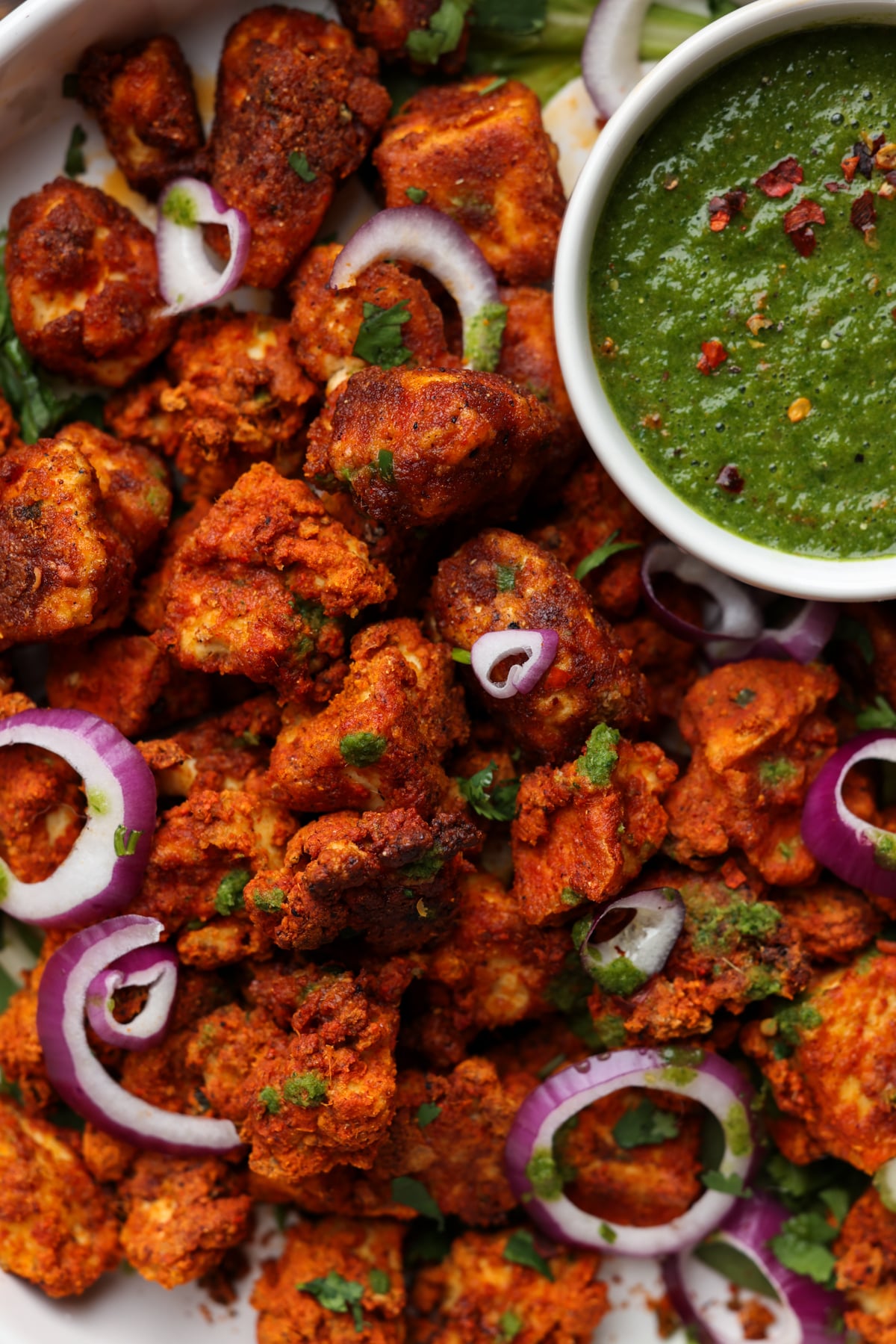 close-up tofu Koliwada with mint chutney on the side