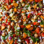 close-up of mango chickpea salad in a serving bowl