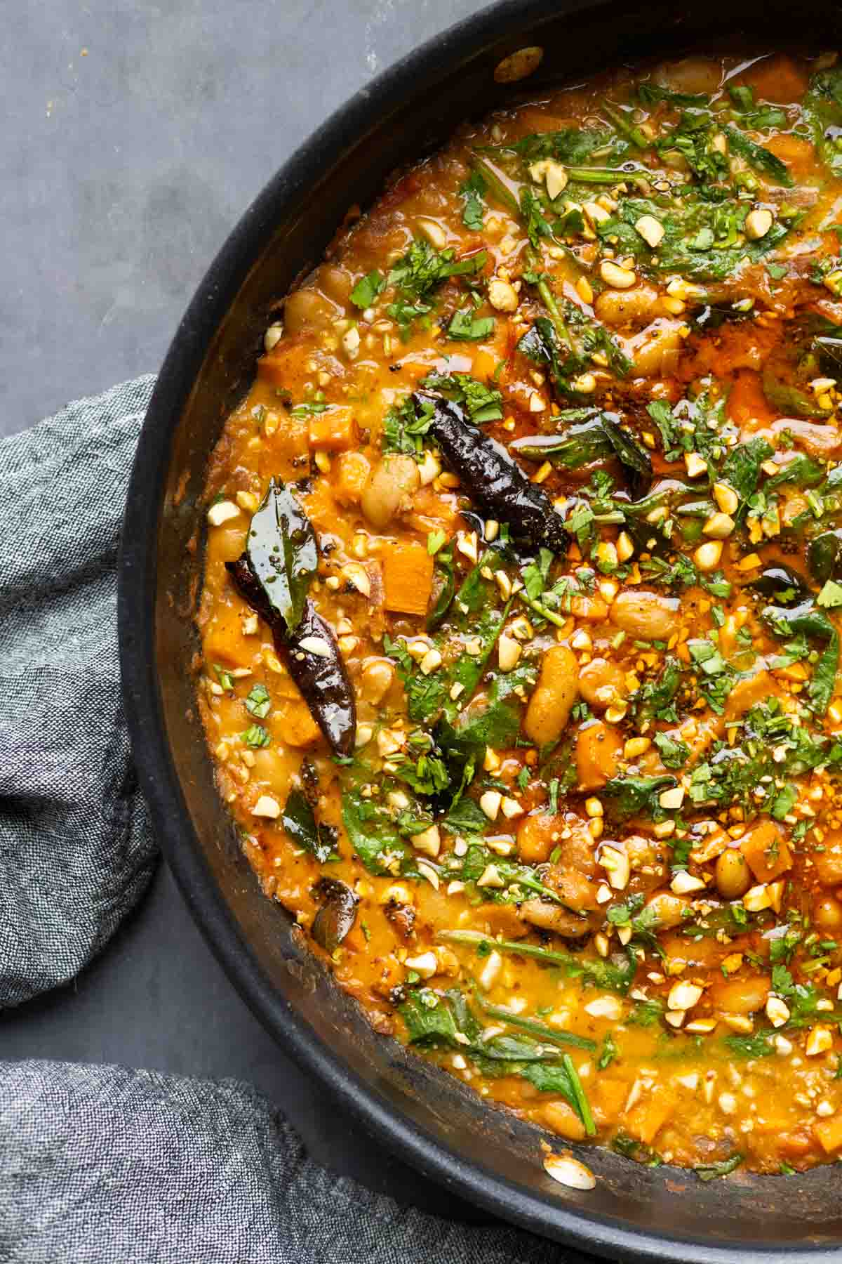 close-up of Indian-inspired white bean stew in the pan