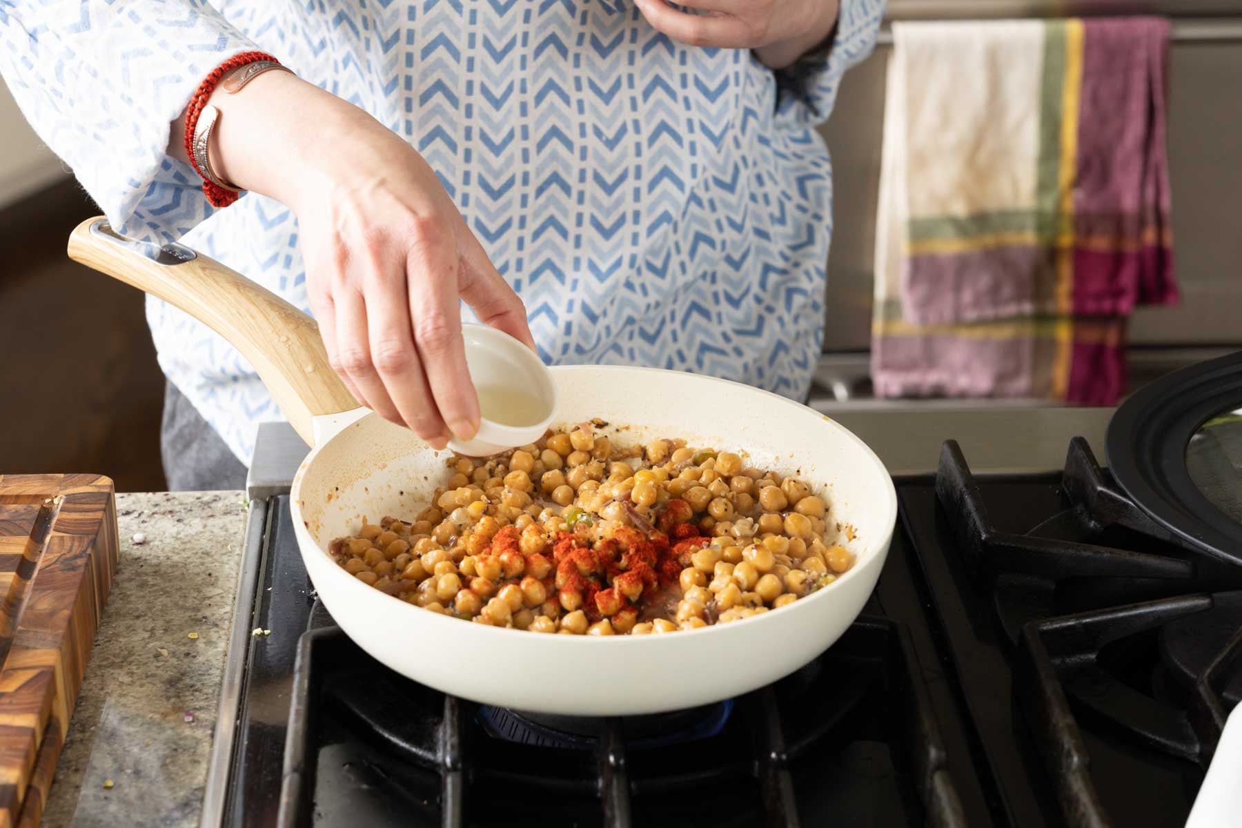 adding ground spices to the pan