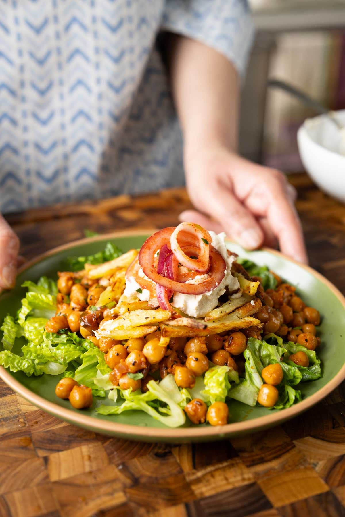 salad made with chili garlic chickpeas and crispy potatoes