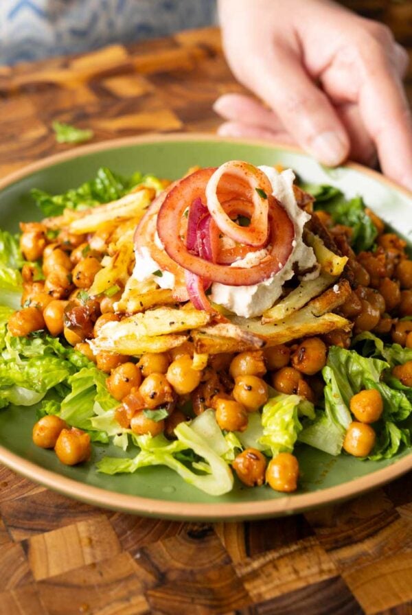 salad made with chili garlic chickpeas and crispy potatoes