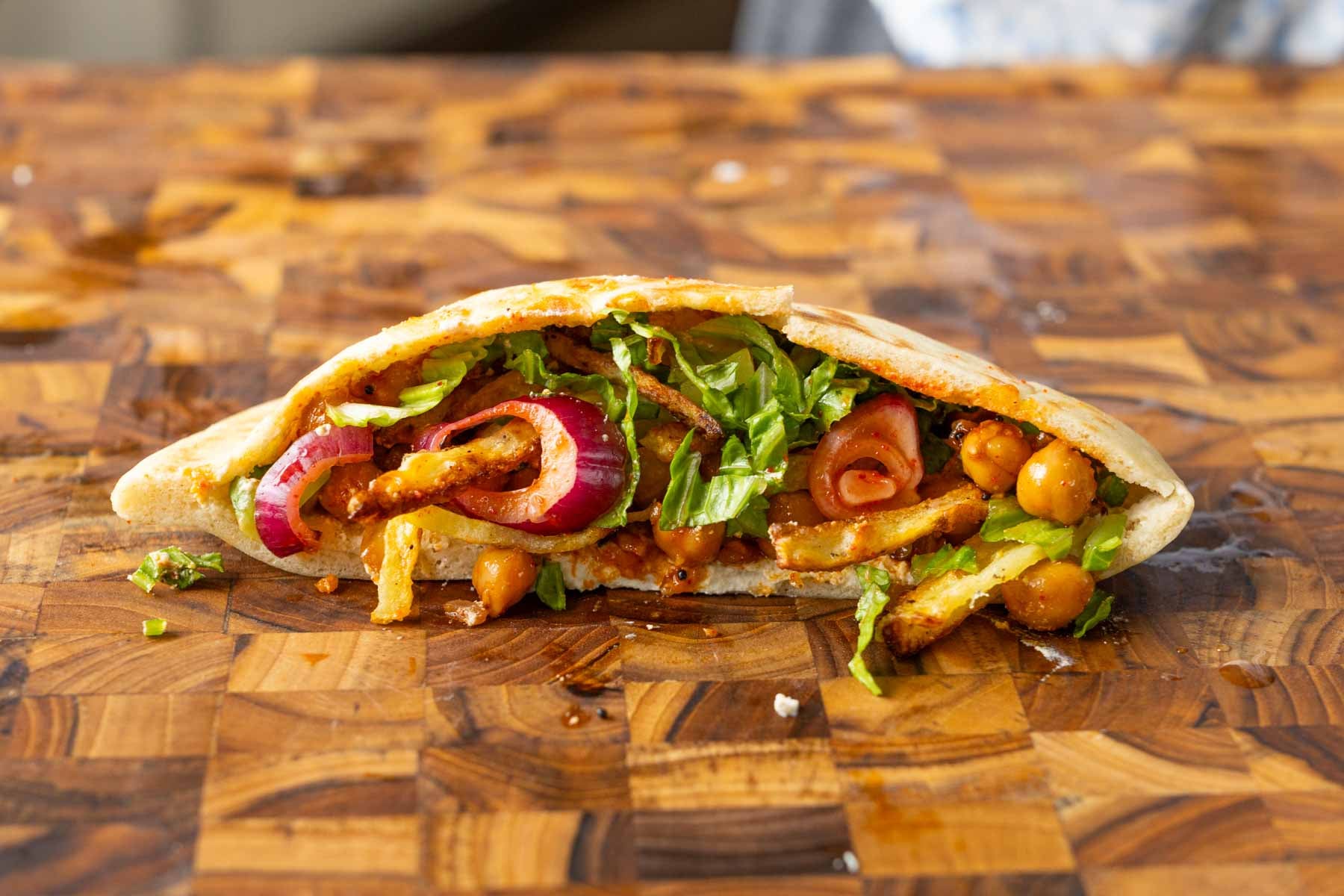 pita made with chili garlic chickpeas and crispy potatoes