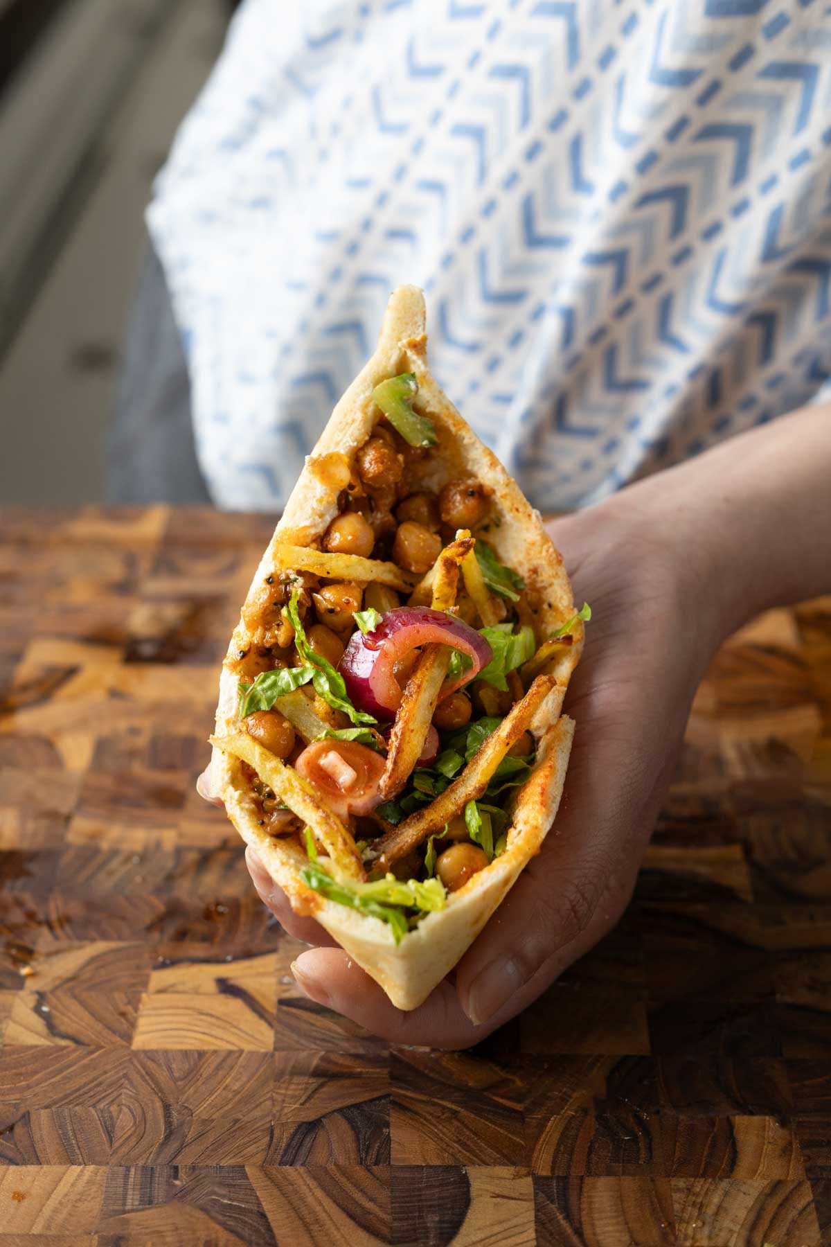pita made with chili garlic chickpeas and crispy potatoes