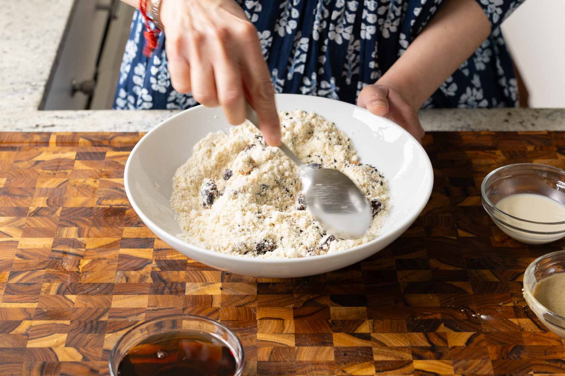 mixing in the black sesame seeds and dates