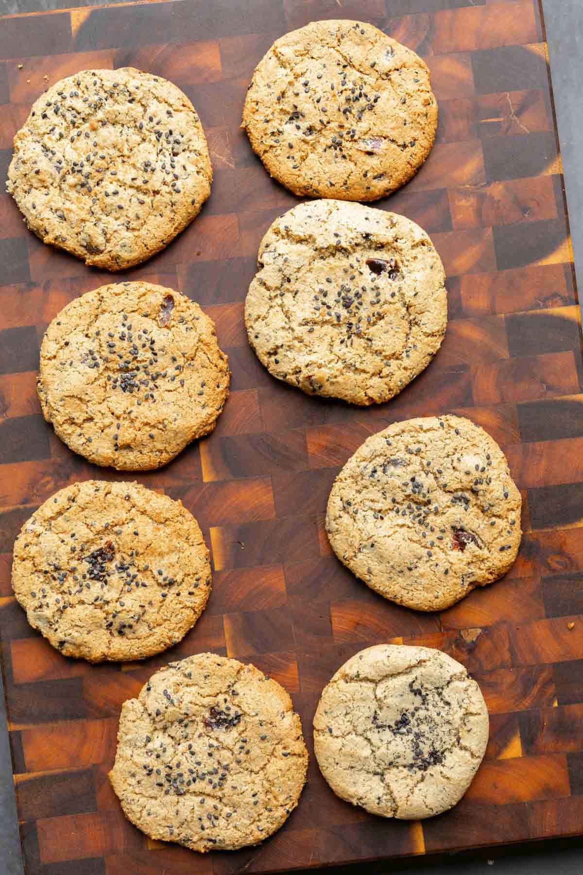 black sesame cookies on a cutting board after cooling