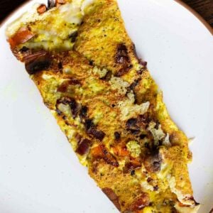 whipped tofu omelette on a white plate