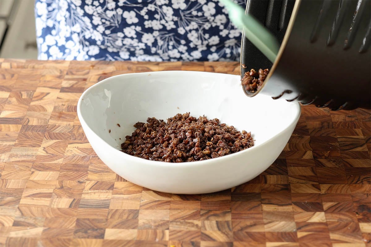 removing crispy lentils from the air fryer