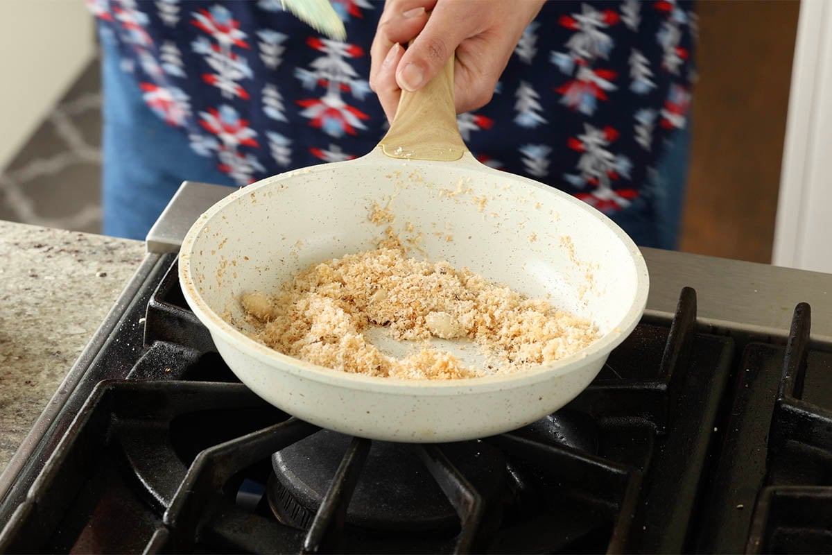 coconut and peanuts in the pan after toasting