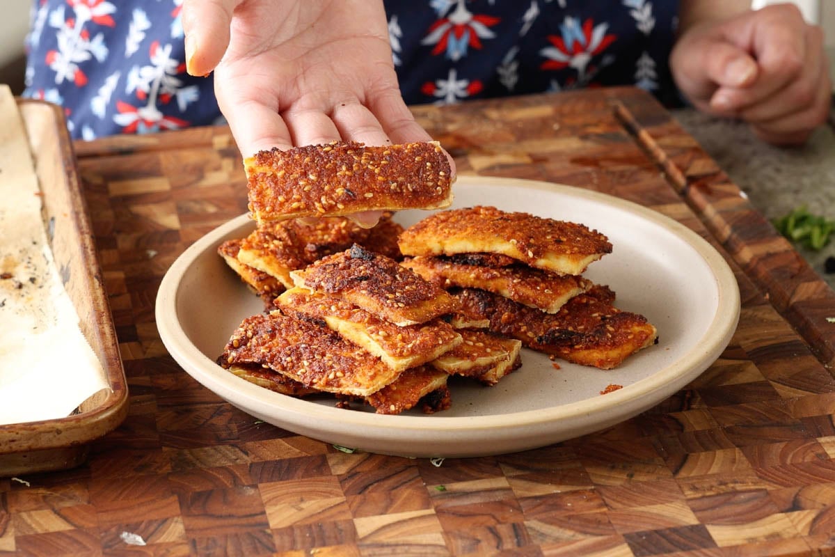 putting the coconut tofu on a plate