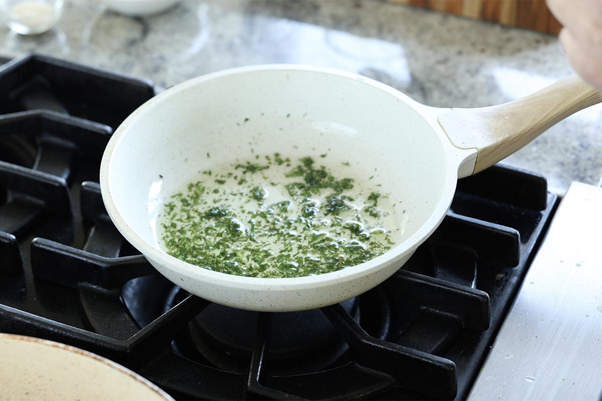 curry leaves sizzling in the hot oil