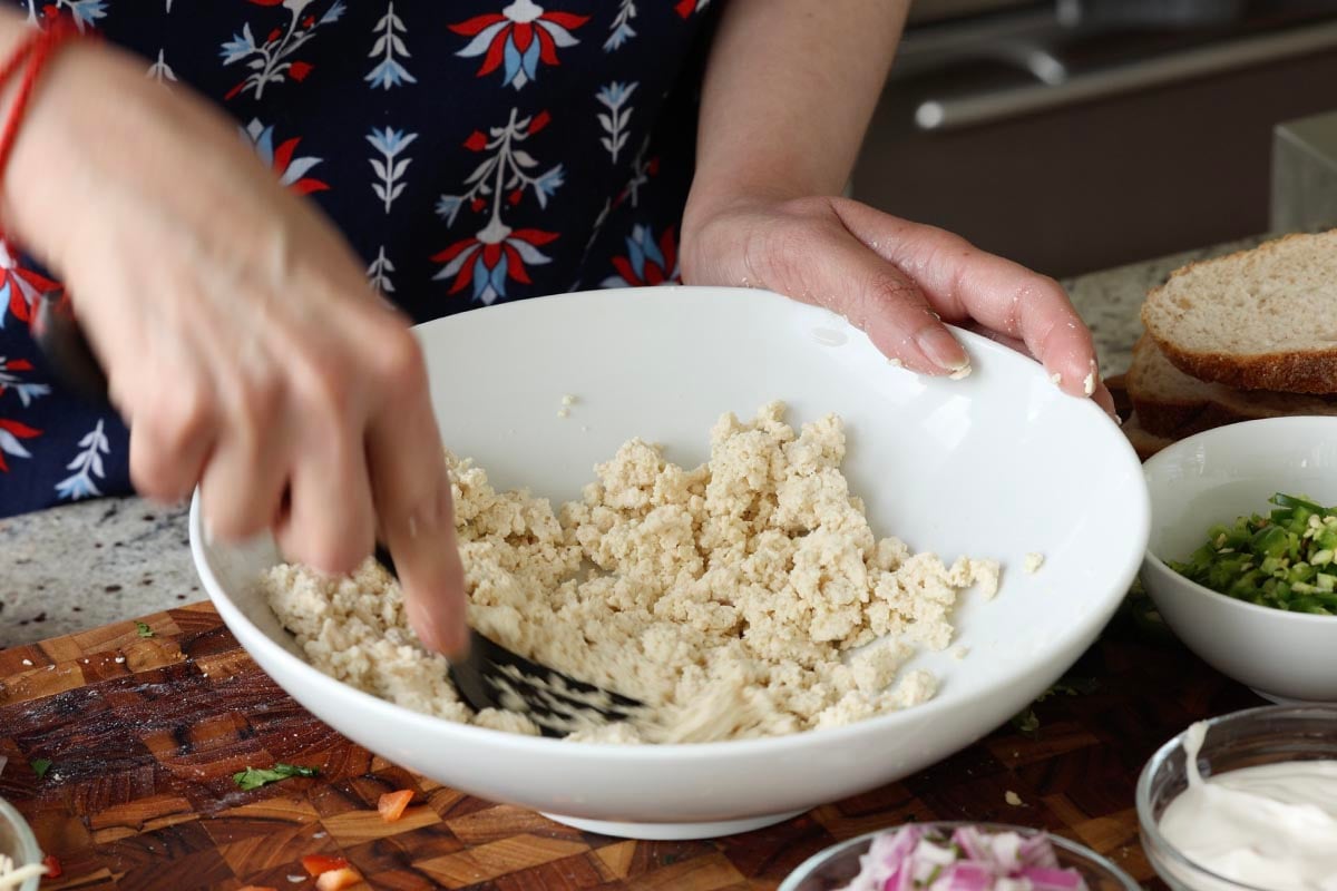 mashing the tofu