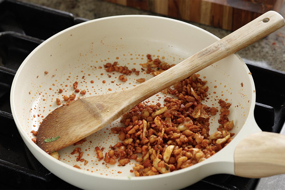 crispy chili lime tempeh after mixing in the lime zest and spices