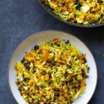 bowl of sambharo-inspired cabbage salad next to the pan