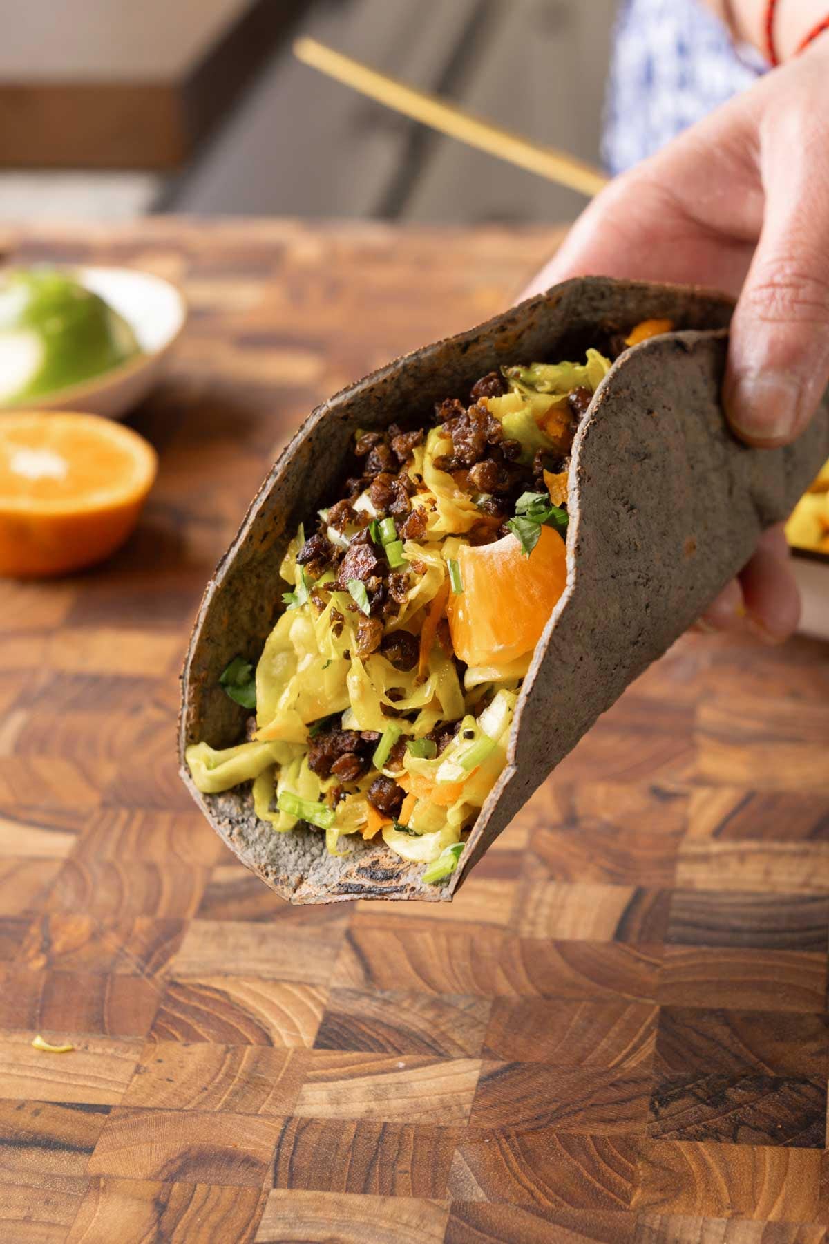 cabbage and crispy lentil taco made with sambharo