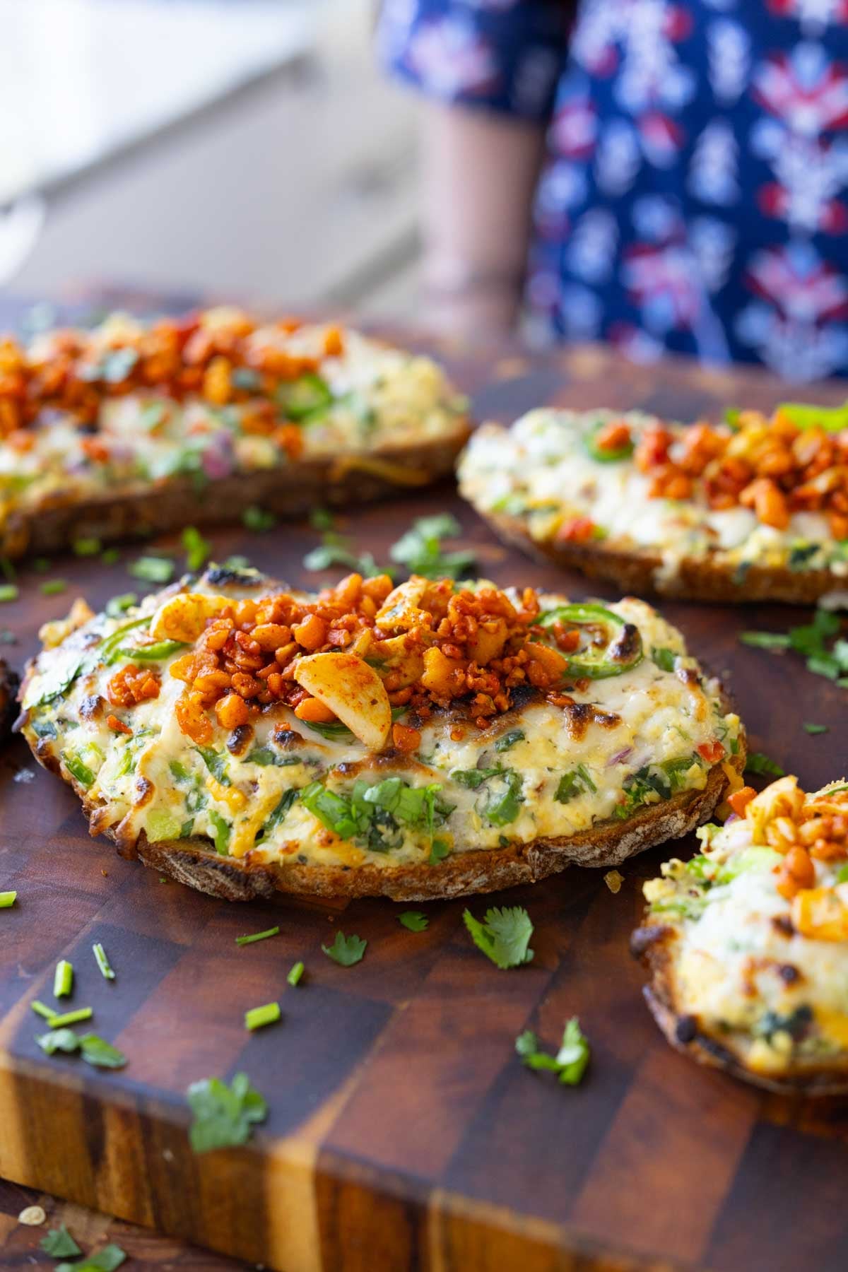 Indian chilli cheese toasts on a cutting board