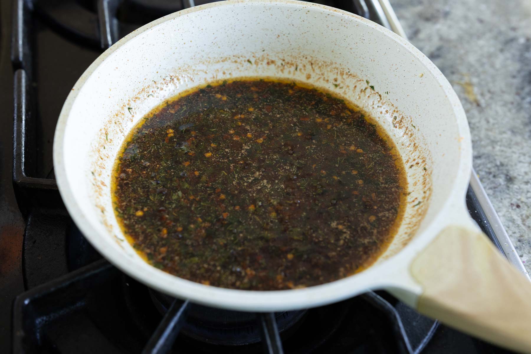 curry leaf glaze in the pan after cooking