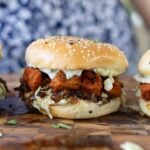 curry tofu sandwich on the cutting board
