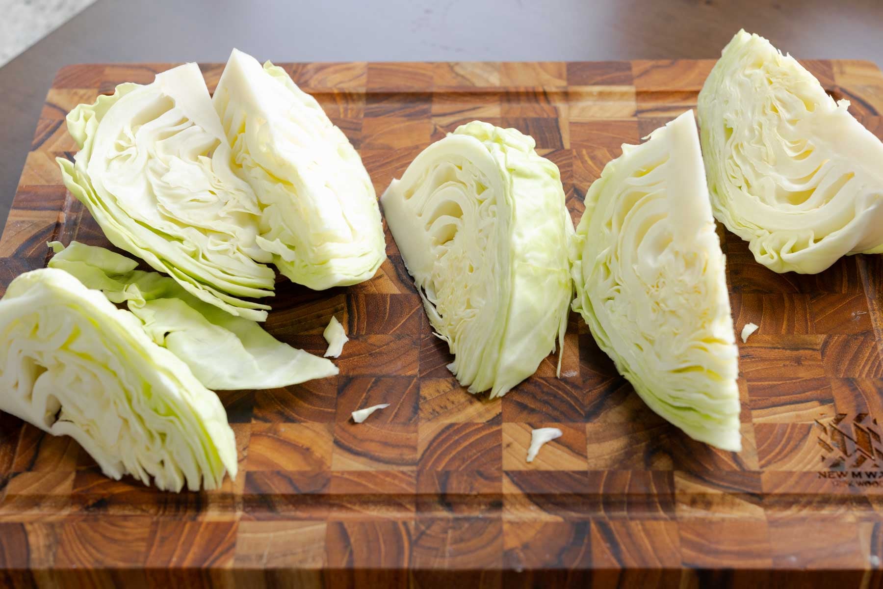 cabbage wedges on the cutting board