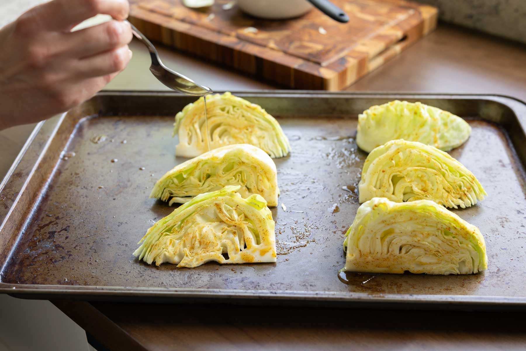 cabbage wedges after brushing with oil and spices