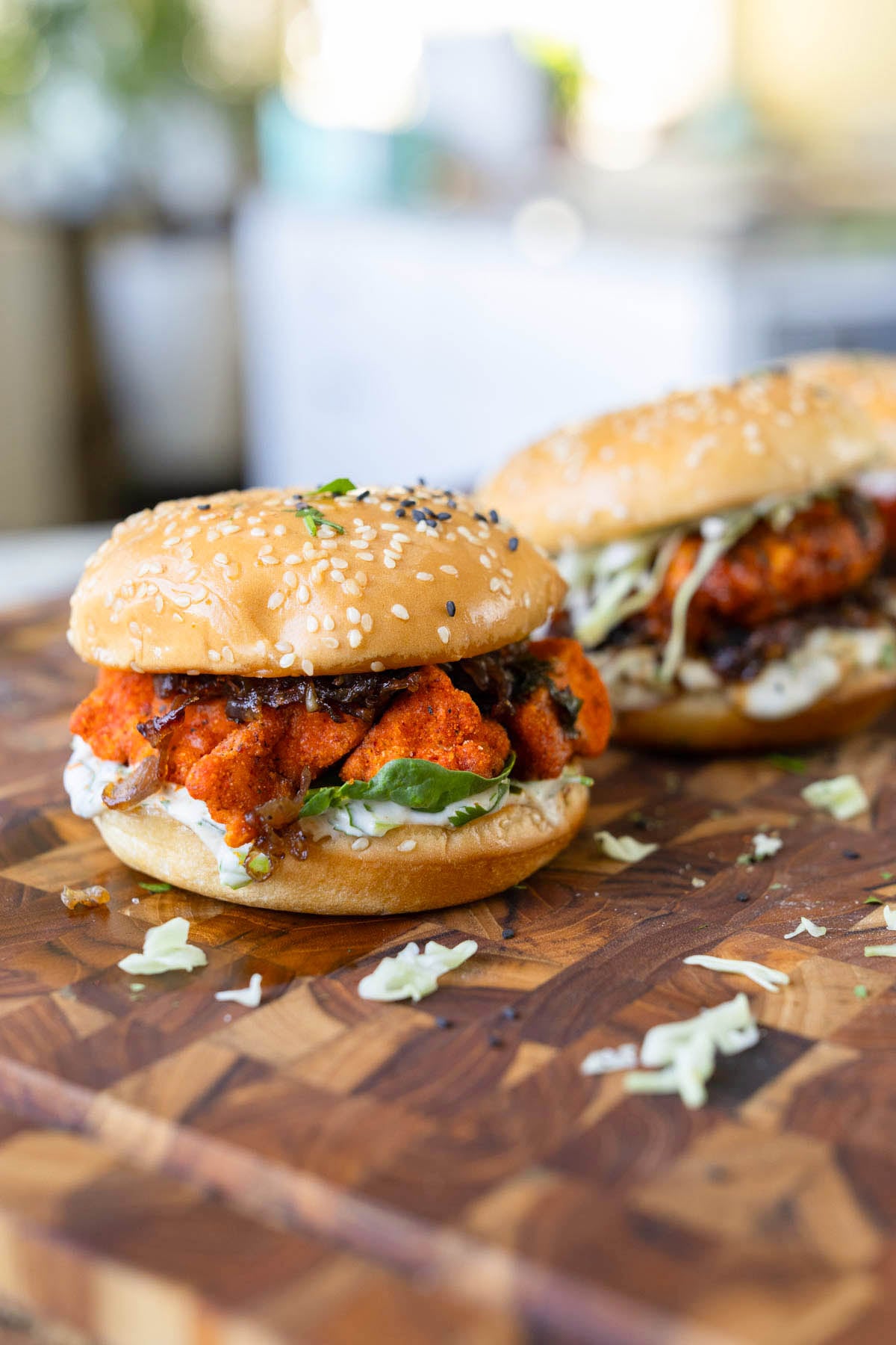 crispy curry tofu sandwich on a cutting board