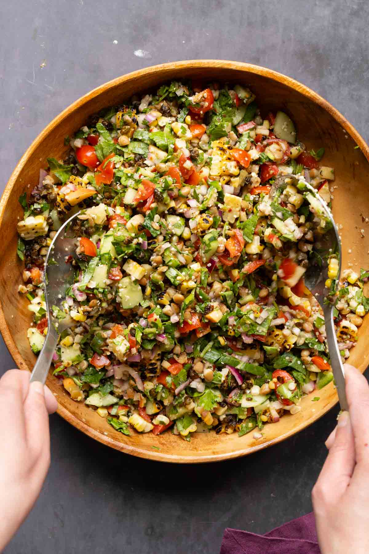 tossing lentil dip together in the bowl